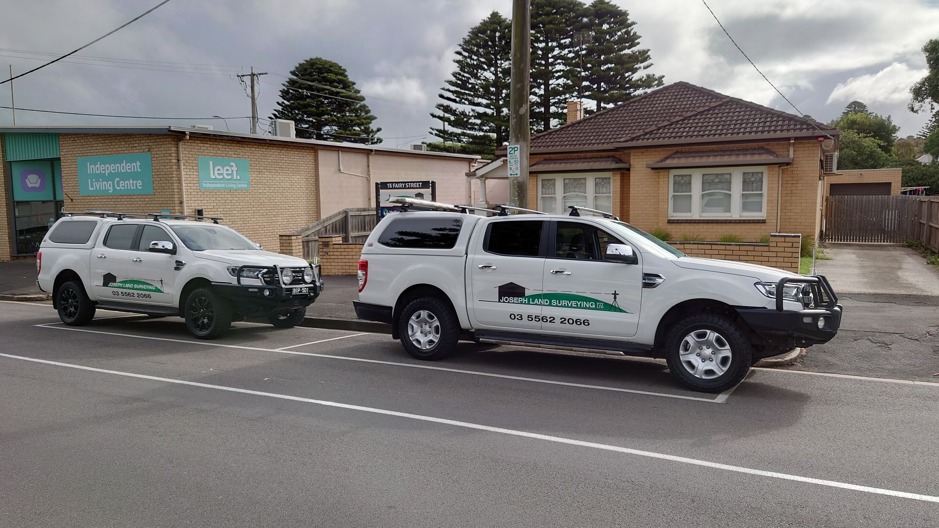 A Man Is Using An Orange Level On A Tripod – Warrnambool, VIC - Joseph Land Surveying