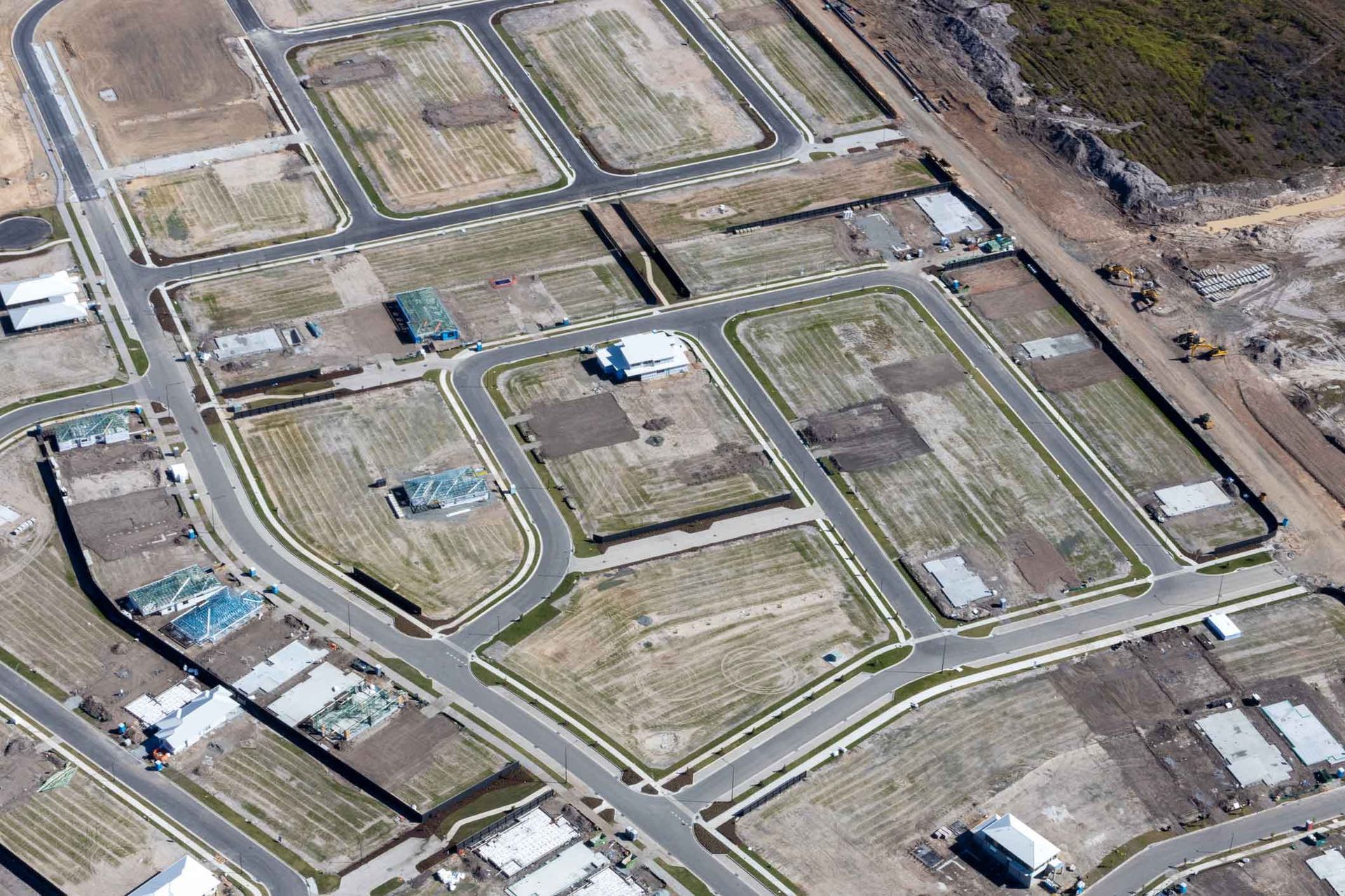An Aerial View Of A Residential Area With Lots Of Houses And Roads – Warrnambool, VIC - Joseph Land Surveying