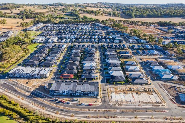 An Aerial View Of A Residential Area With Lots Of Houses And Trees – Warrnambool, VIC - Joseph Land Surveying
