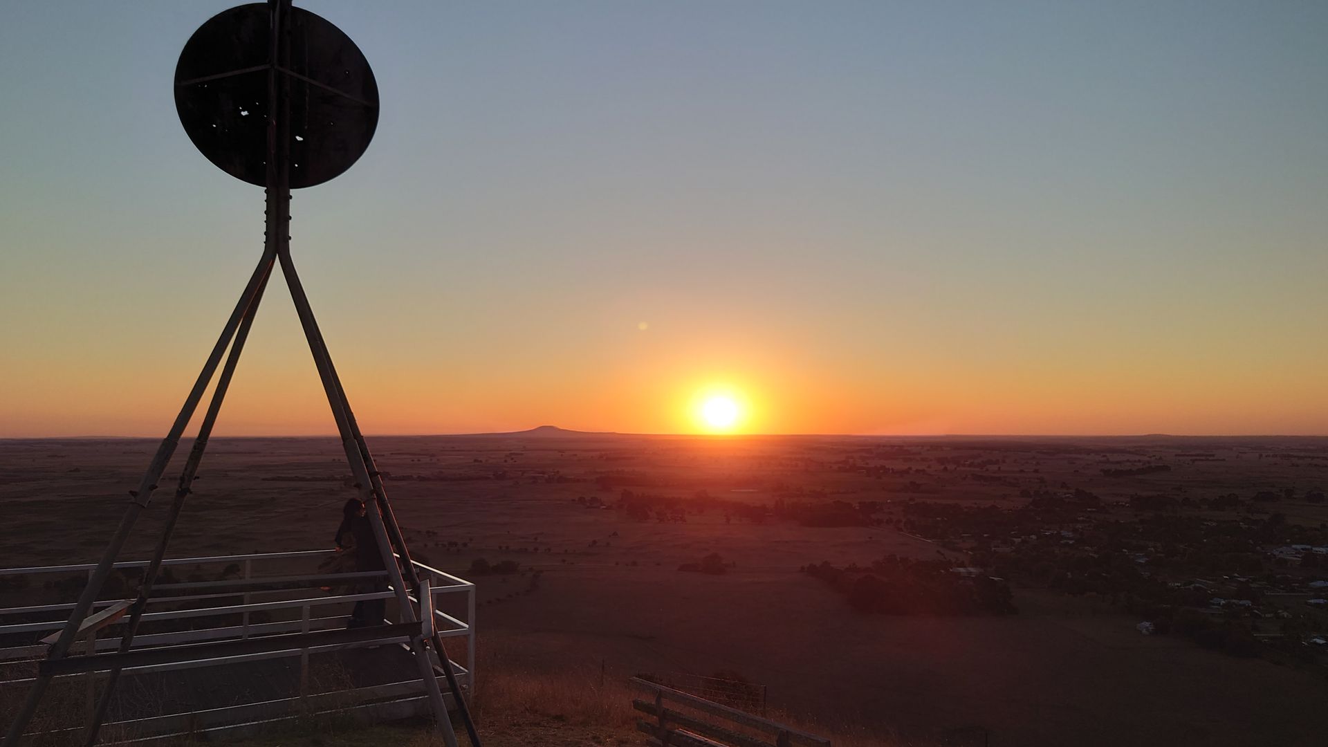 A Man In A Hard Hat Is Holding A Clipboard At A Construction Site – Warrnambool, VIC - Joseph Land Surveying