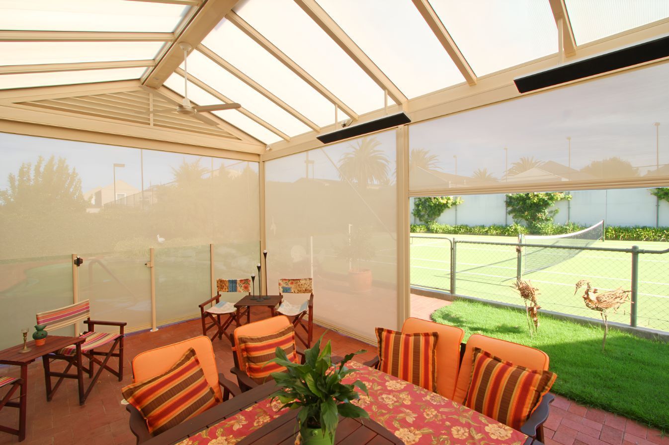A Patio With a Table and Chairs Under a Canopy — South Burnett Garage Doors In Yarraman, QLD