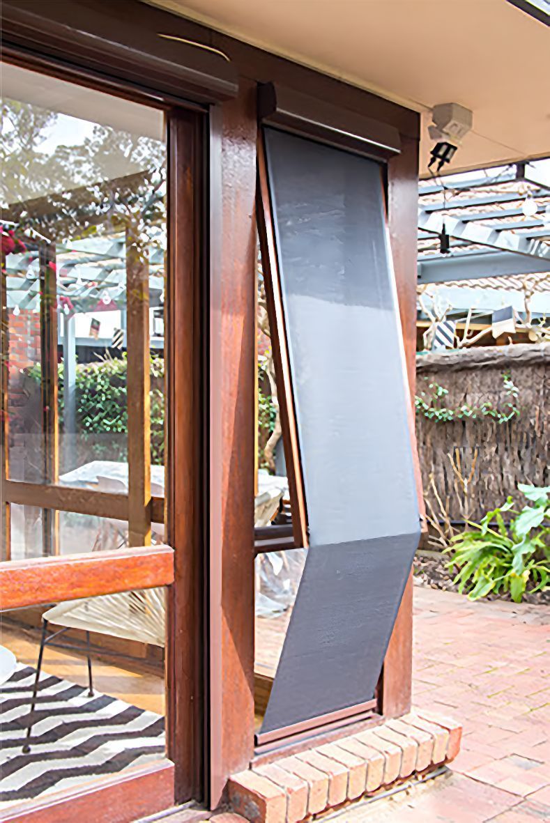 A Sliding Glass Door With a Screen on the Side of It — South Burnett Garage Doors In Blackbutt, QLD