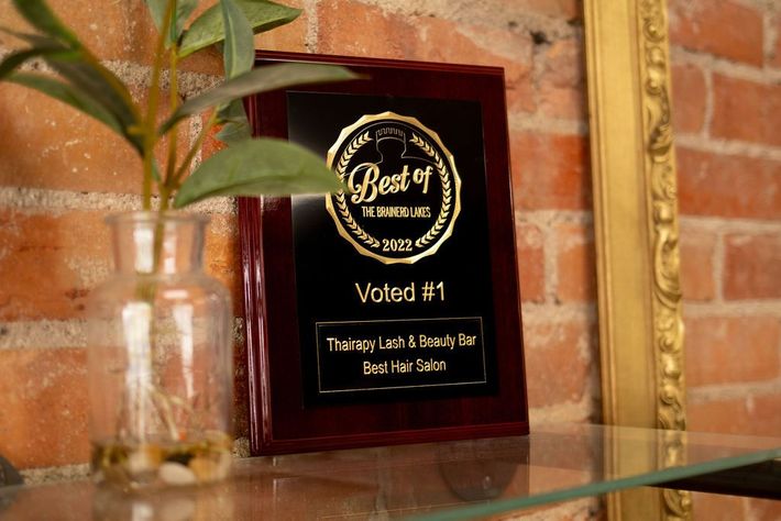 A plaque that says best of voted # 1 on it