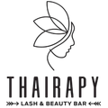 A black and white logo for thairapy lash and beauty bar