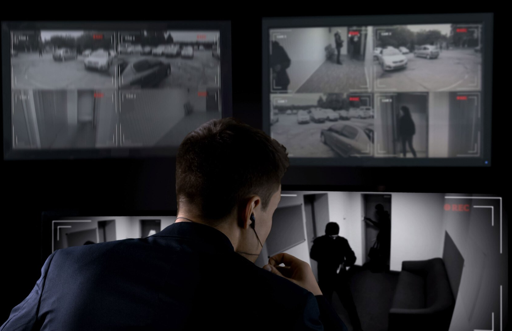 Man Monitoring The Security Cameras — Cleveland, OH — Safe Choice LLC