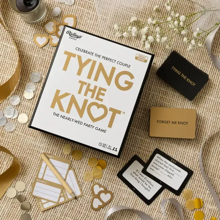 A box that says tying the knot on it