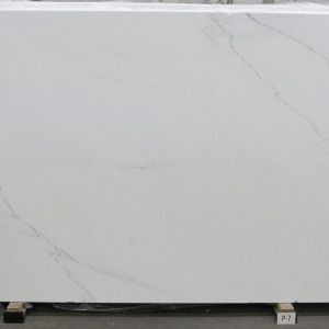 White countertop slab with gray veining.