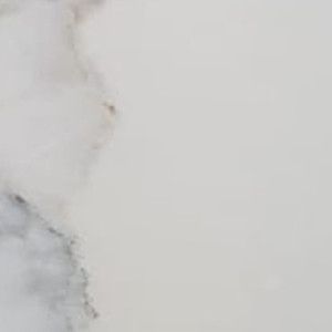 White marble with gray and tan veining.