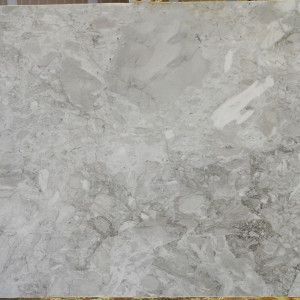 Grey marble tile with subtle veining and color variations.