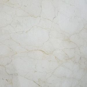 Creamy white marble with beige veining.