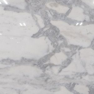 White marble surface with gray veining.