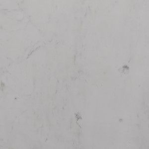 White marble surface with subtle gray veining.