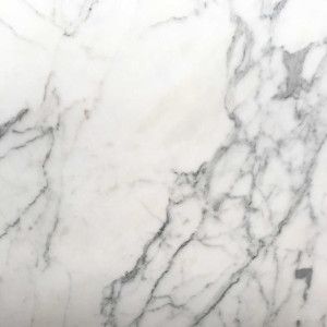 White marble surface with gray veining.