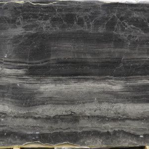 Dark gray and silver marble slab with layered veining.