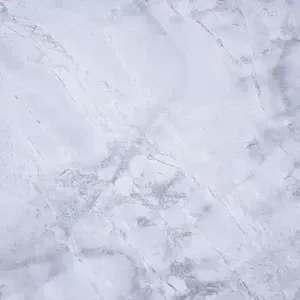 White marble surface with gray veining.