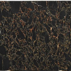 Black and gold marble tile with brown veining and irregular patterns.