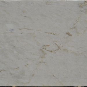 Light beige marble slab with gold veining.
