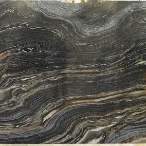 Dark marble slab with swirling black, gray, brown, and white patterns.