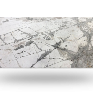 White marble slab with gray veining and cracks.