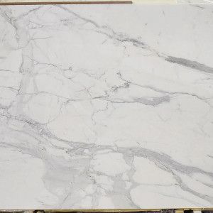 White marble slab with gray veining.