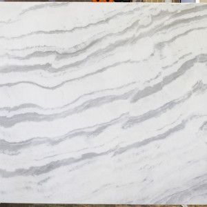 White marble slab with gray flowing veins.