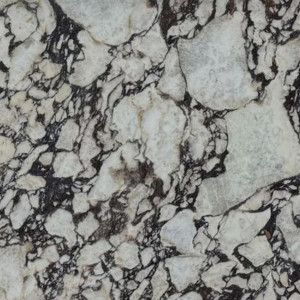 White and black marble stone texture with irregular patterns.