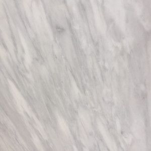 White marble surface with gray veining.