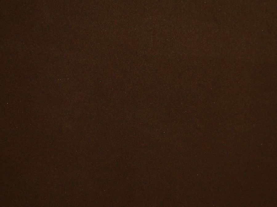 Solid brown background.