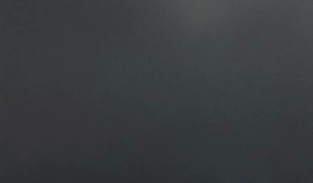 Dark gray background.