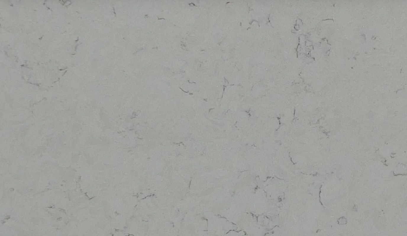 Gray and white quartz countertop with subtle veining.