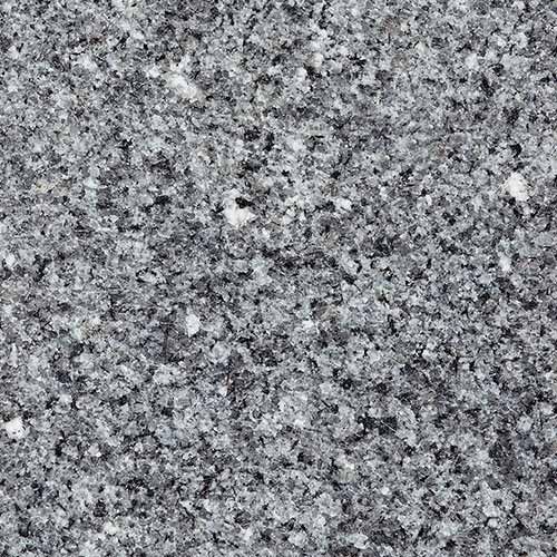 Gray granite surface with speckled black and white inclusions.