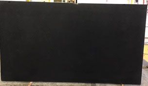 Solid black granite countertop slab.