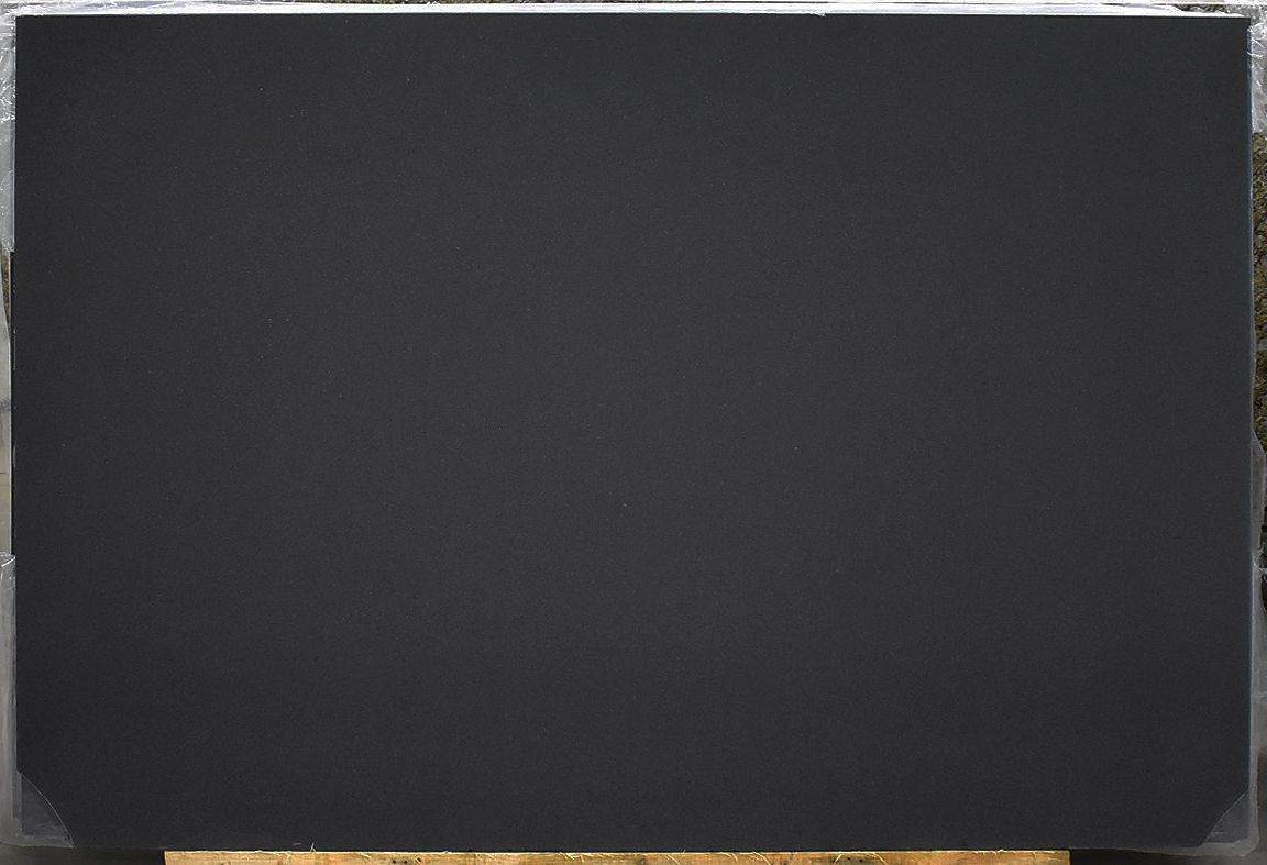 Black rectangle on a light surface, likely a chalkboard or a screen.