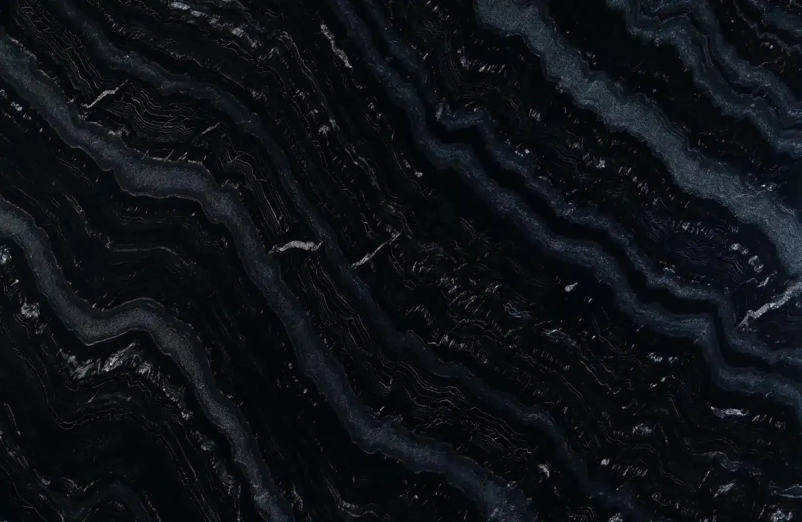 Black marble with wavy, greyish-white veining.
