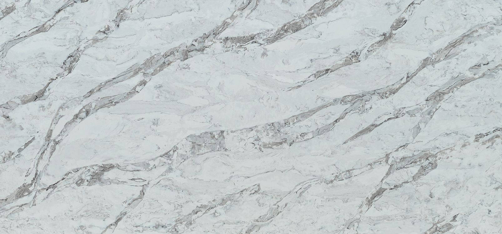 White marble countertop with gray veining.