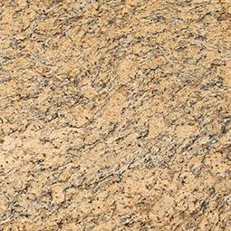 Golden granite with dark and light brown swirls and specks.