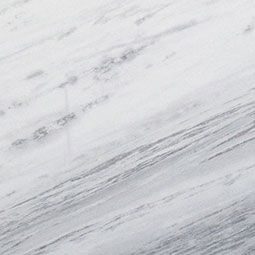 White marble with gray veining, diagonal lines.