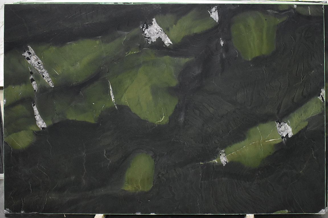 Dark green marble slab with light green and white veining.