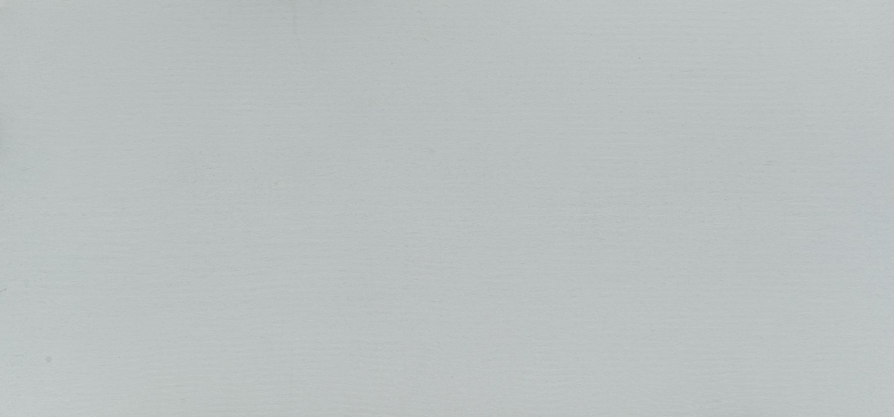 Solid light gray background.