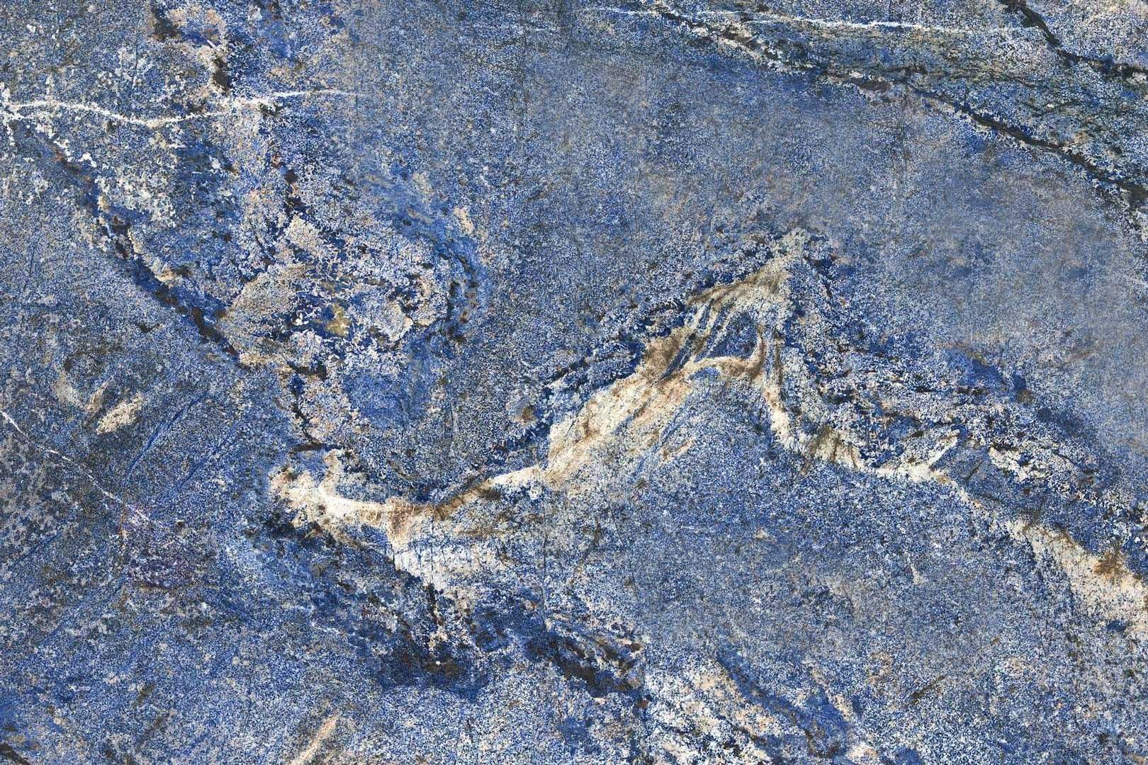 Blue granite with white and brown veins.