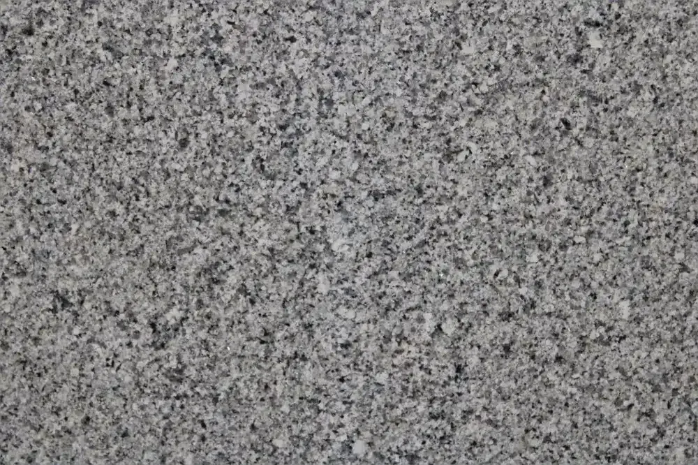 Gray granite surface with speckled texture.