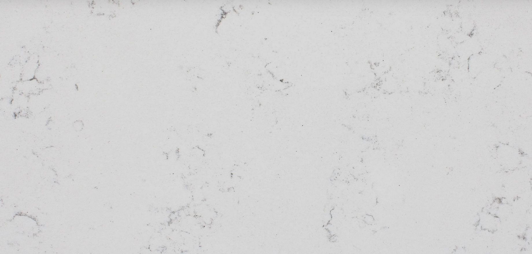 White stone surface with gray veining and subtle texture.
