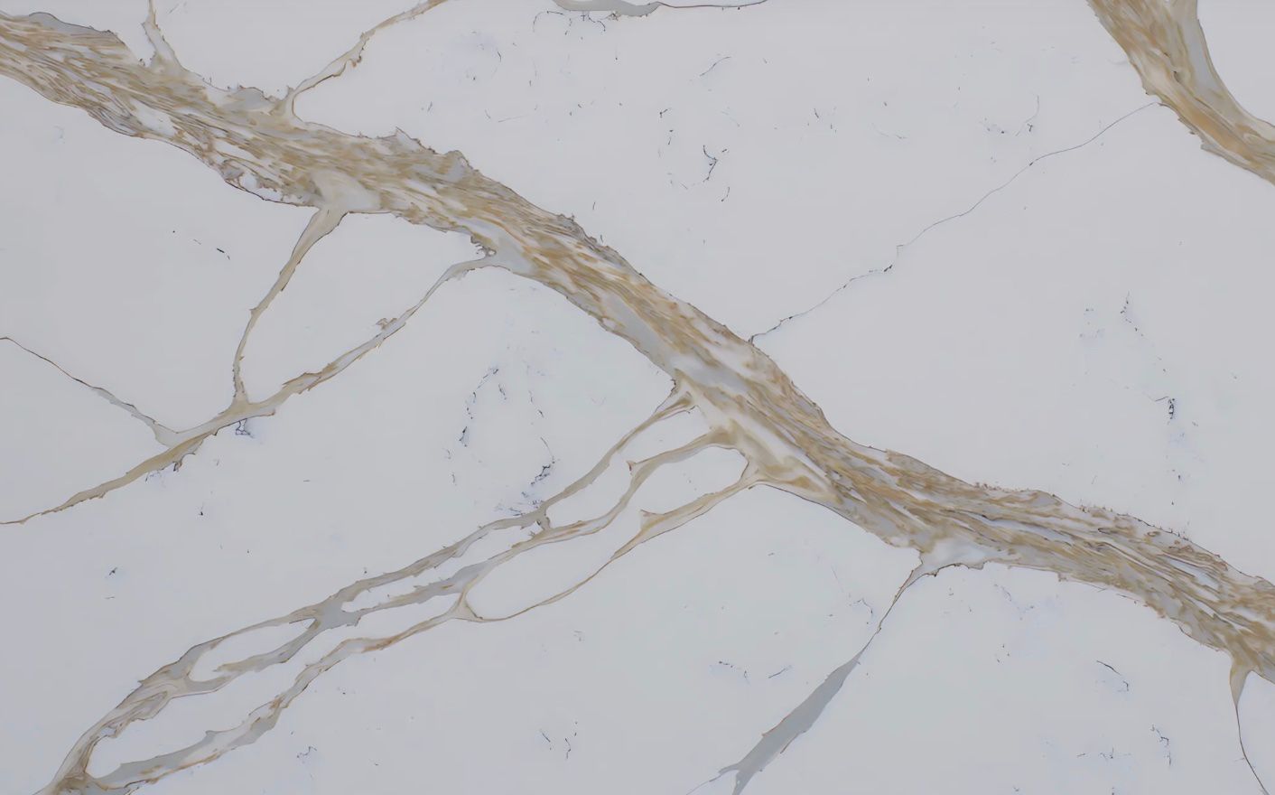 White surface with gold-brown veining resembling marble or quartz.