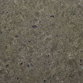 Gray speckled countertop with dark brown flecks.