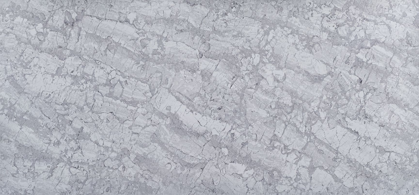 Gray and white textured background with wavy patterns.