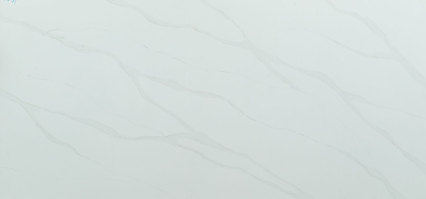 White marble surface with light gray veining.