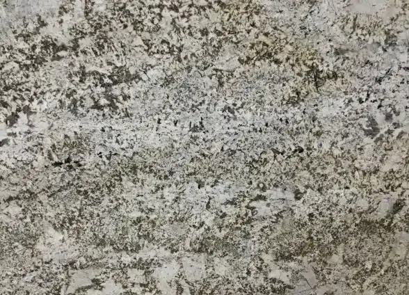 Gray and white granite stone surface with a mottled appearance.