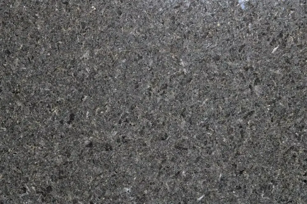 Dark gray speckled stone texture.