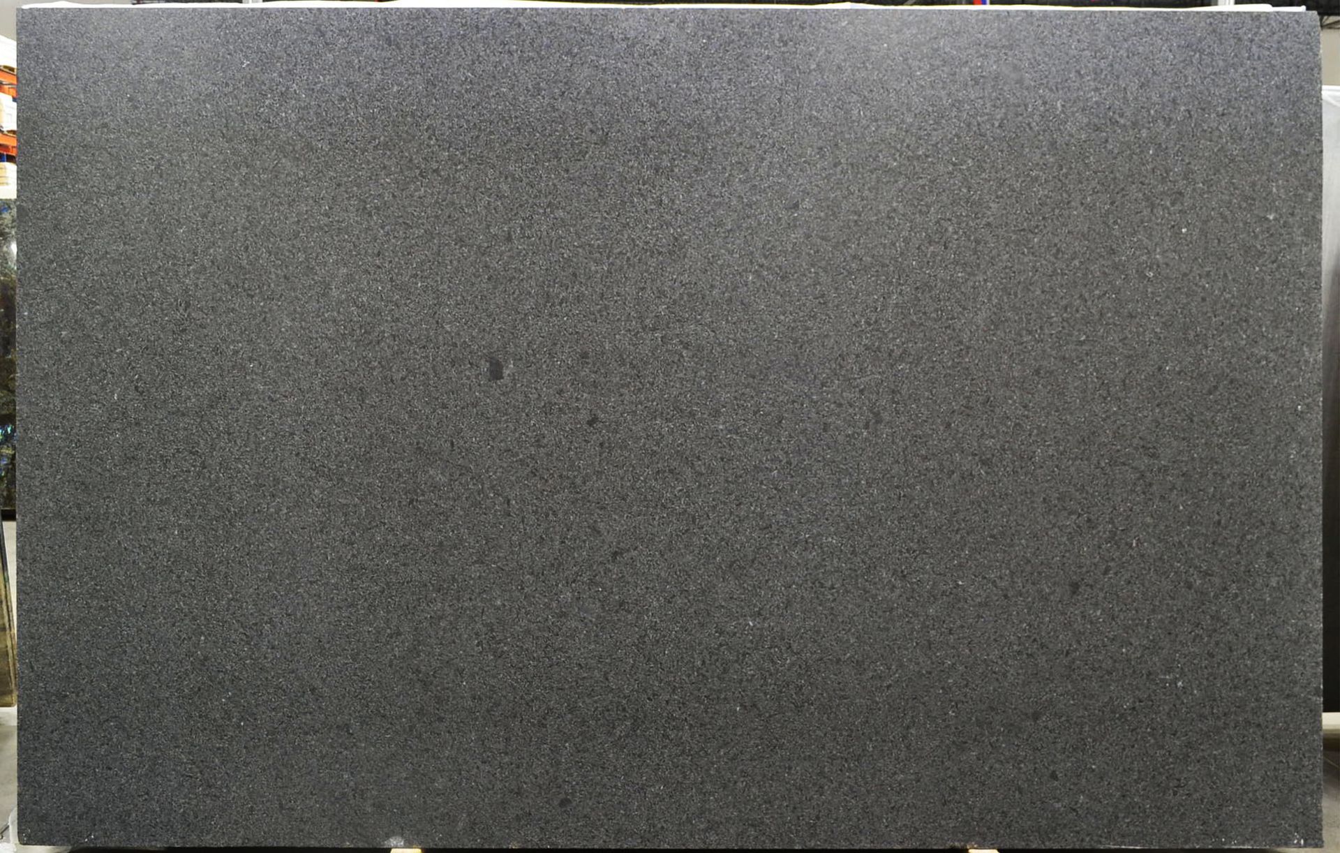 Large slab of dark gray granite.