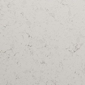 White quartz countertop with subtle gray veining and speckles.
